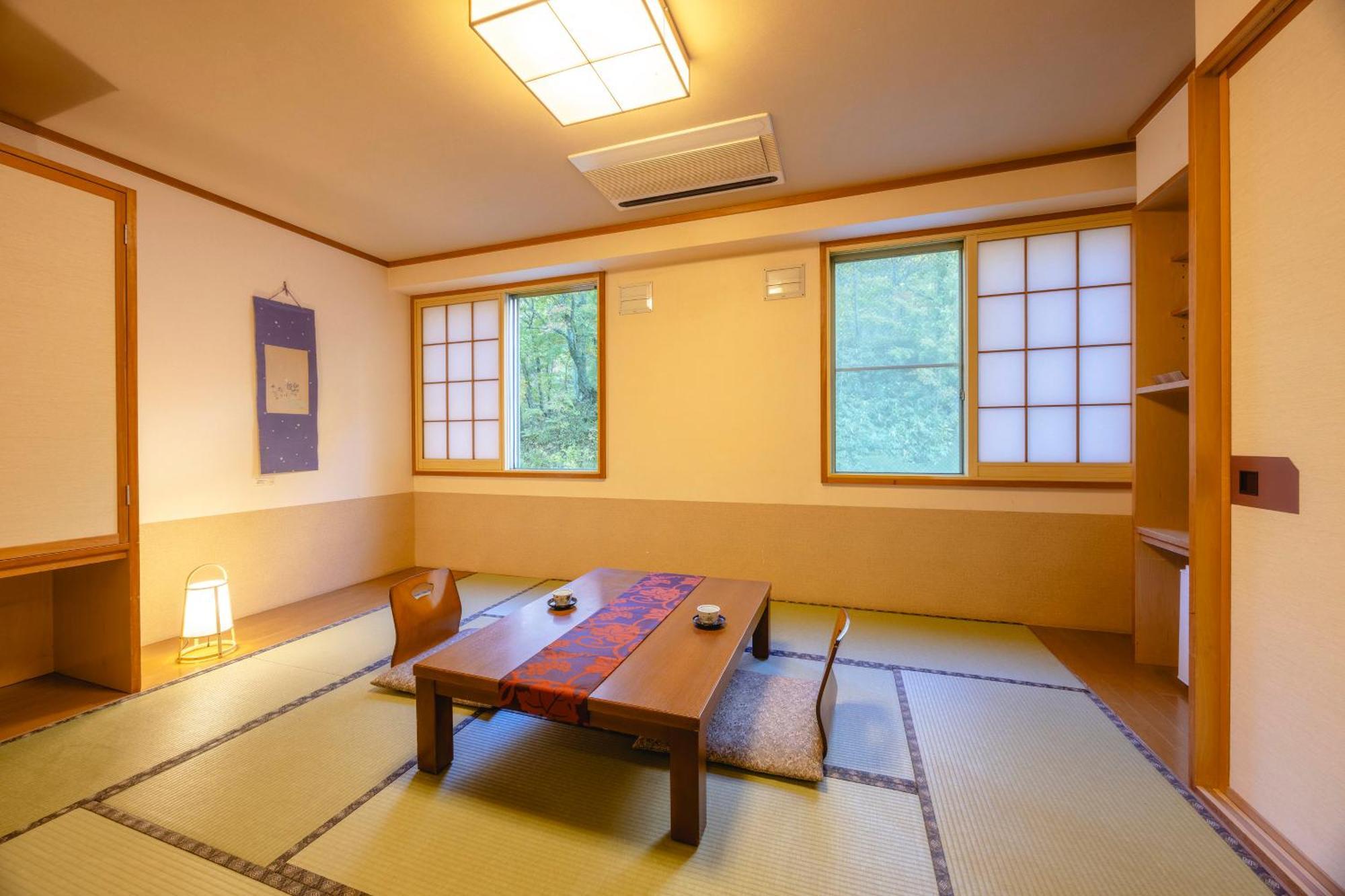 Отель Shikishimaso Higashikawa Экстерьер фото