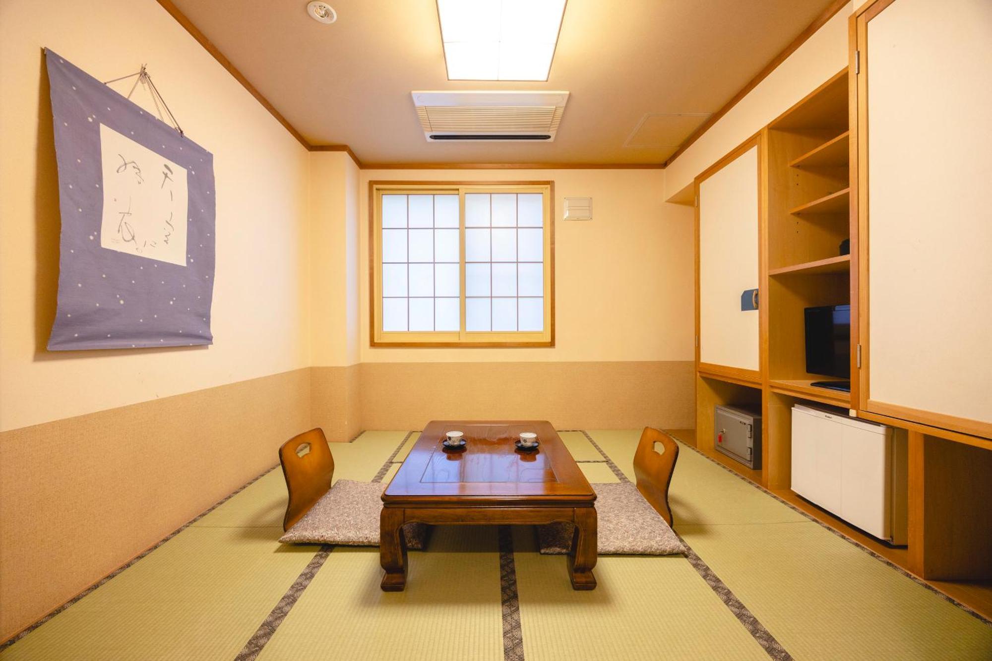 Отель Shikishimaso Higashikawa Экстерьер фото