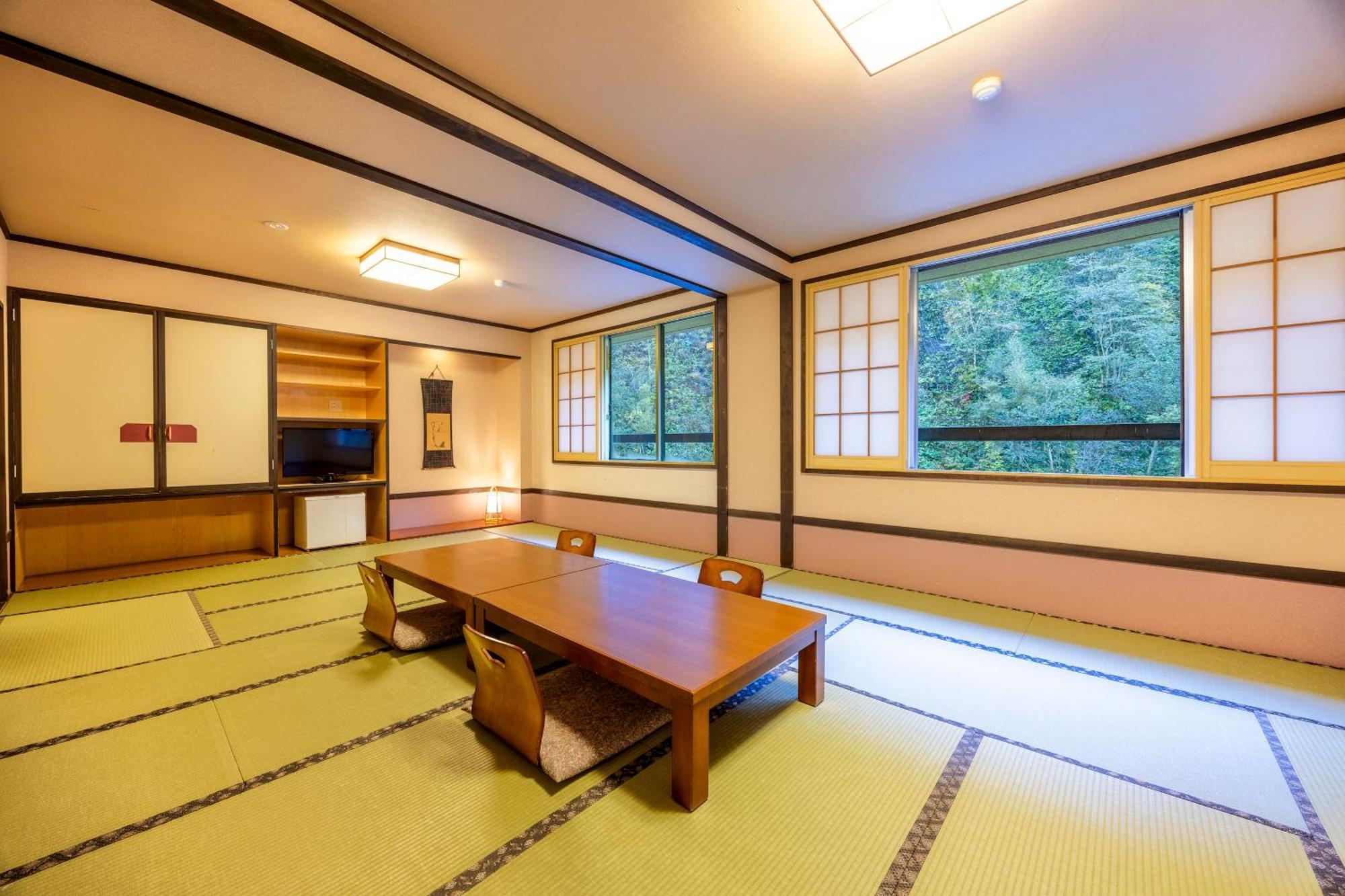 Отель Shikishimaso Higashikawa Экстерьер фото